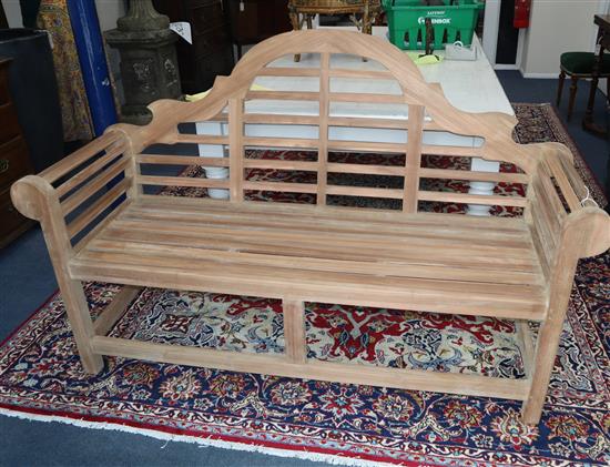 A Lutyens style garden bench W.165cm